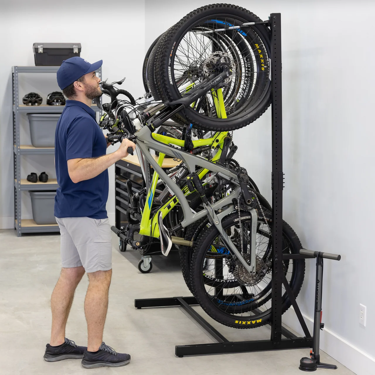 Spire employee hanging bikes 